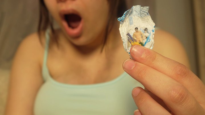Amayamori - Giantess Girl unwraps a candy but is surprised because there is a tiny man in the candy bag. She is curious to see what it tastes like, so she tries it. It seems that the tiny man really annoys her, so she starts sucking it like a candy.